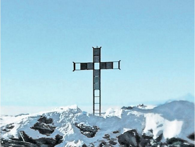 Abgesägt. Vom Gipfelkreuz blieben nichts als ein steinbedeckter Sockel und Schrauben übrig.  